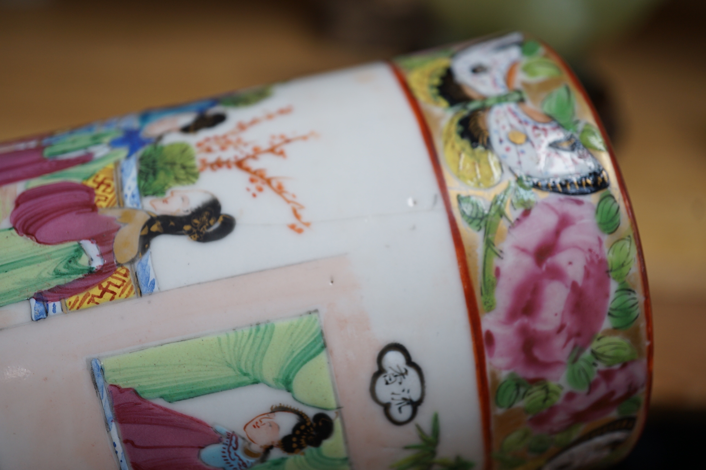 A pair of 19th century Cantonese famille rose porcelain brushpots, decorated with figural scenes, together with a further pair of Japanese export vases (4)